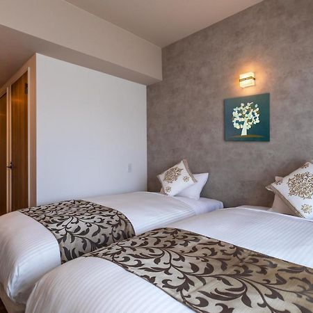 Mr Kinjo 万座ビーチ前 Aparthotel Onna Eksteriør bilde