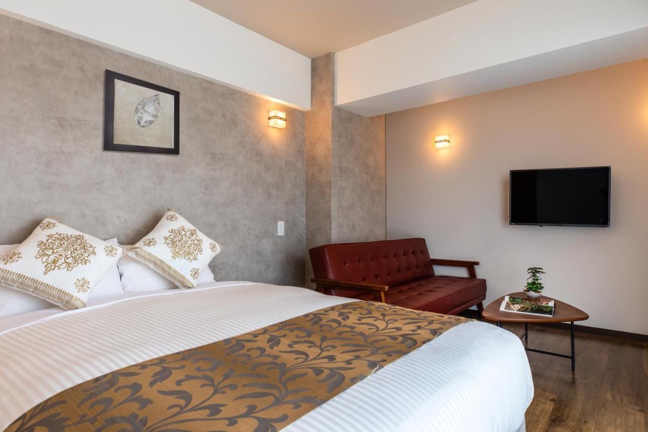 Mr Kinjo 万座ビーチ前 Aparthotel Onna Eksteriør bilde