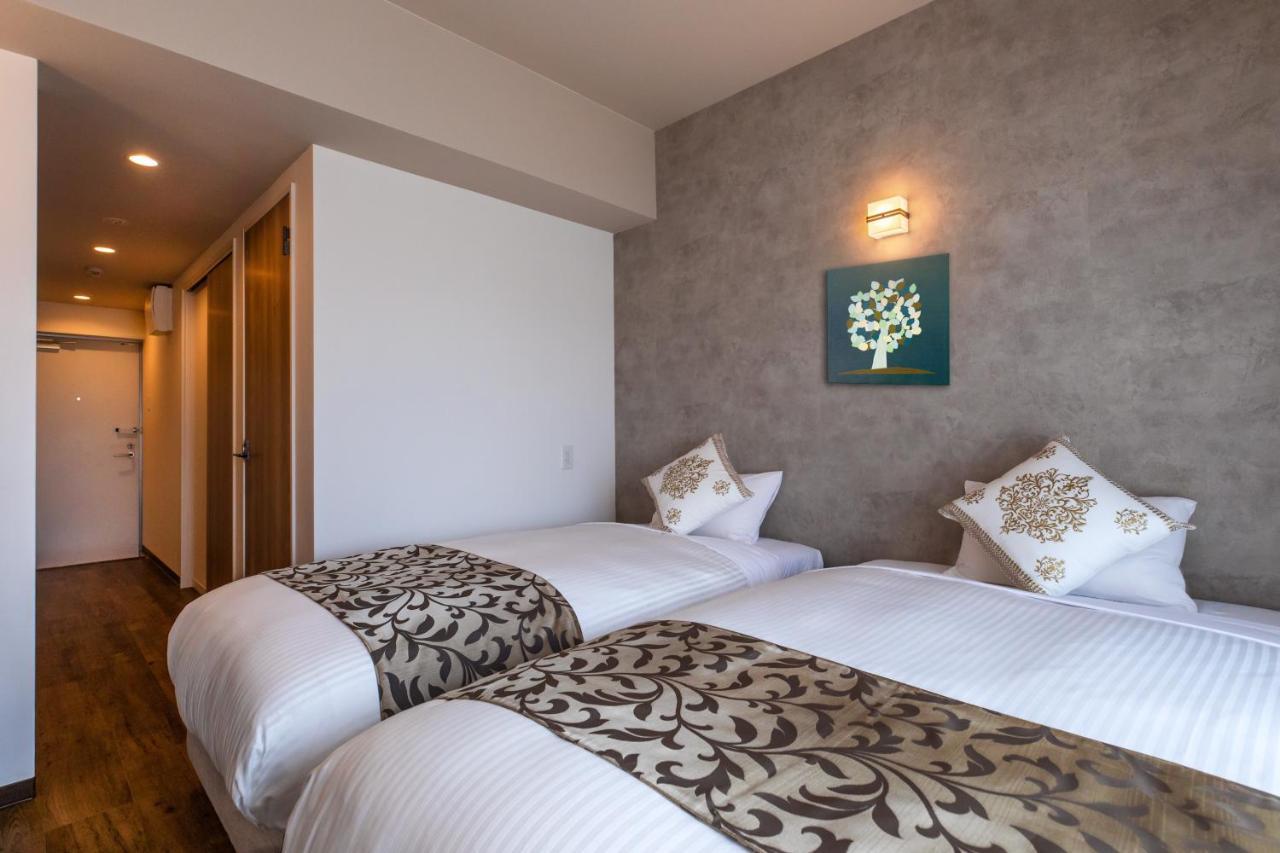 Mr Kinjo 万座ビーチ前 Aparthotel Onna Eksteriør bilde
