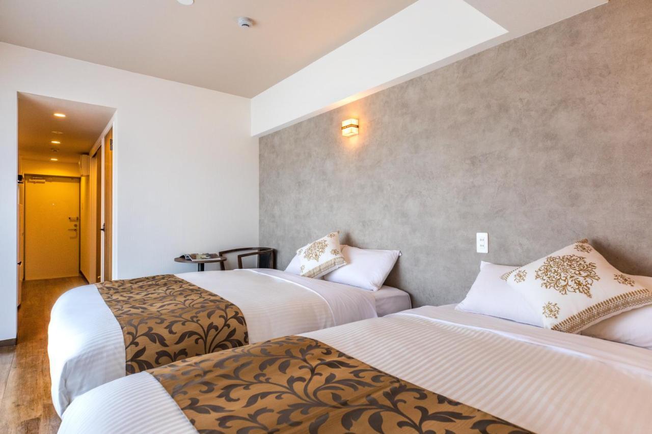 Mr Kinjo 万座ビーチ前 Aparthotel Onna Eksteriør bilde