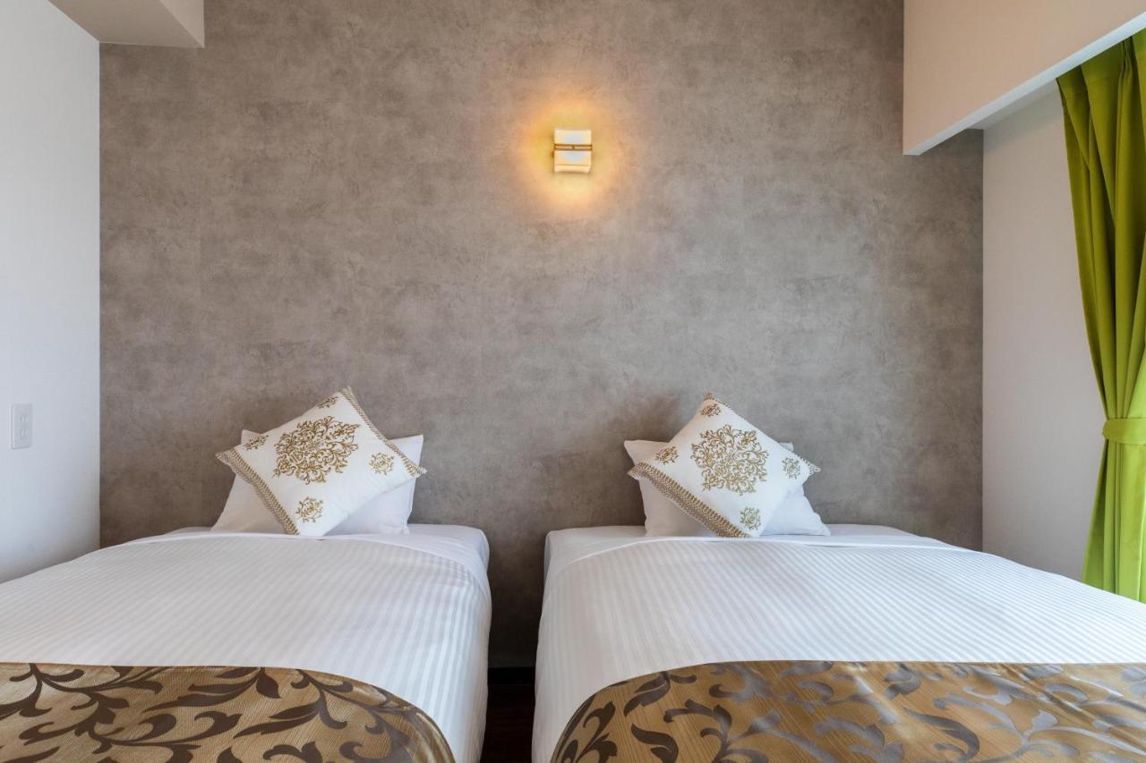 Mr Kinjo 万座ビーチ前 Aparthotel Onna Eksteriør bilde