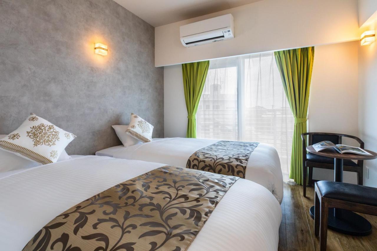 Mr Kinjo 万座ビーチ前 Aparthotel Onna Eksteriør bilde